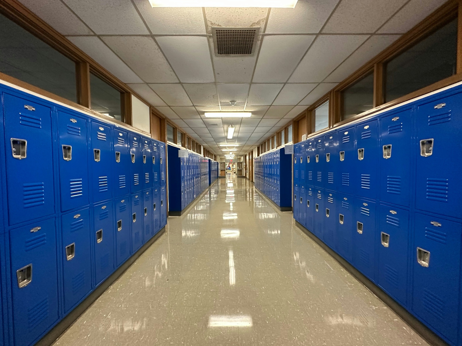 School hallway with blue lockers